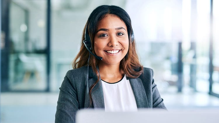 Customer support specialist wearing a headset